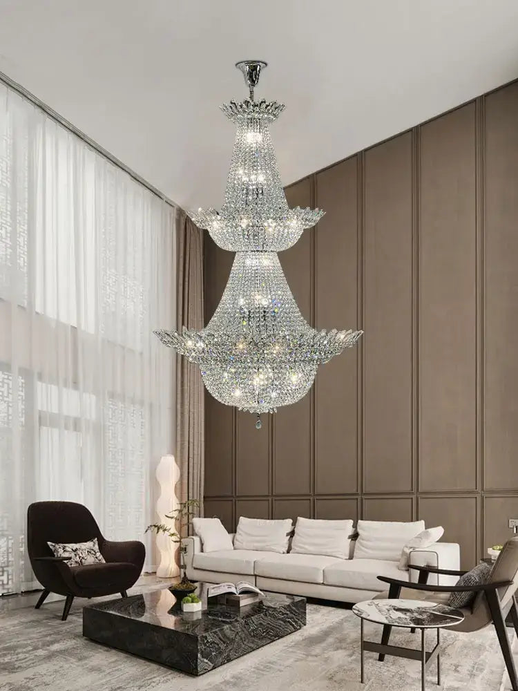A multi-tiered decorbites k9 crystal chrome led chandelier with polished chrome finish for living room lighting