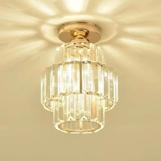 A tiered decorbites black gold minimalist led chandelier with gold-toned metal and clear glass prisms in concentric rings