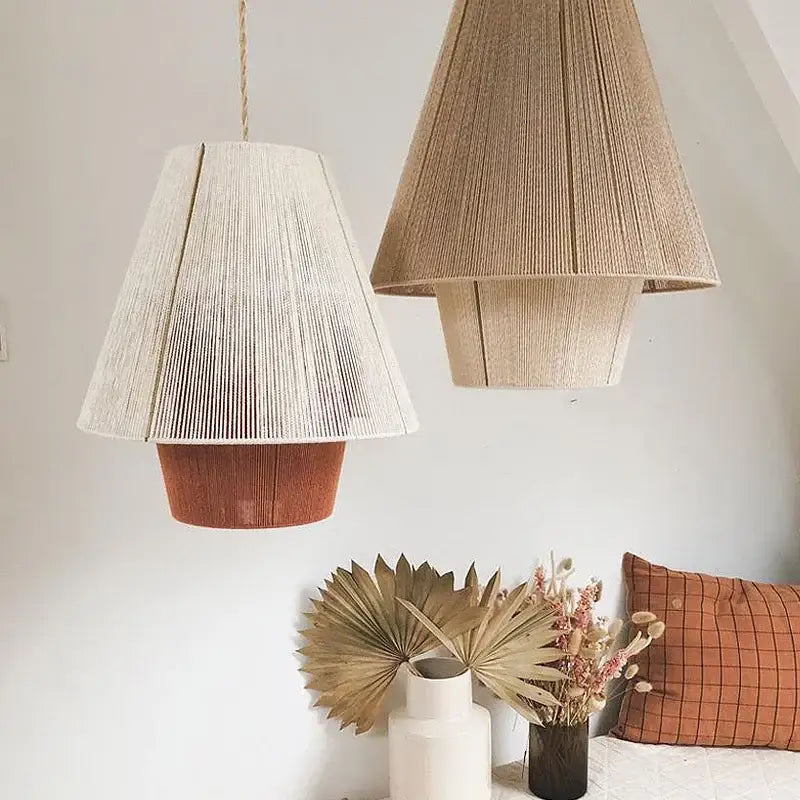 Two woven pendant lamps with cream and beige hemp rope rattan weave shades for warm dining room decorbites lighting