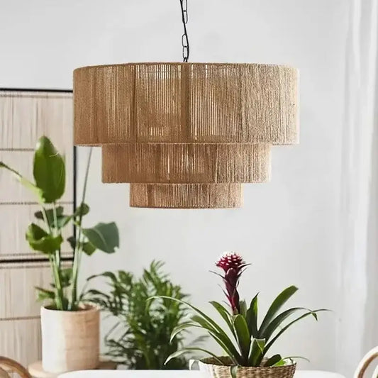 Tall tiered pendant wall lamp with natural woven rattan shade and black chain suspension decorbites hemp rope wall
