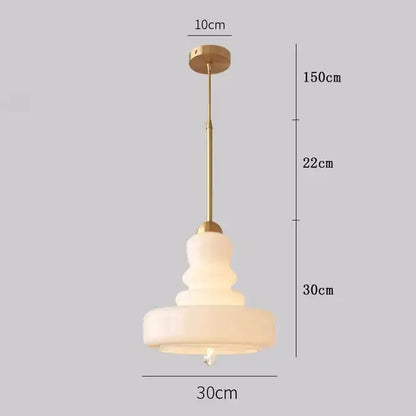 Modern tiered yellow glass pendant lights with brass accents for kitchens featuring frosted glass pendant lights ceiling design