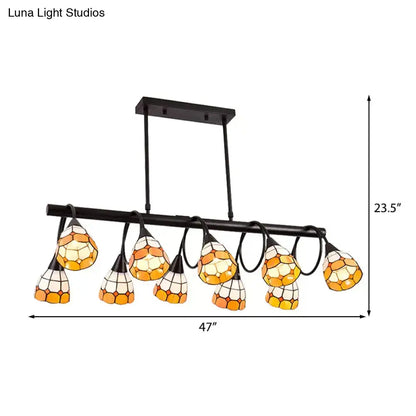 Black metal DecorBites™ chandelier with seven orange yellow white stained glass shades for kitchen island lighting
