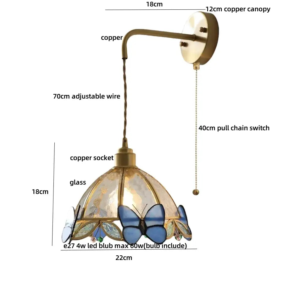 Antique brass-finished copper wall lamp with blue and clear tiffany butterfly glass shade for bedroom decorbites tiffany butterfly