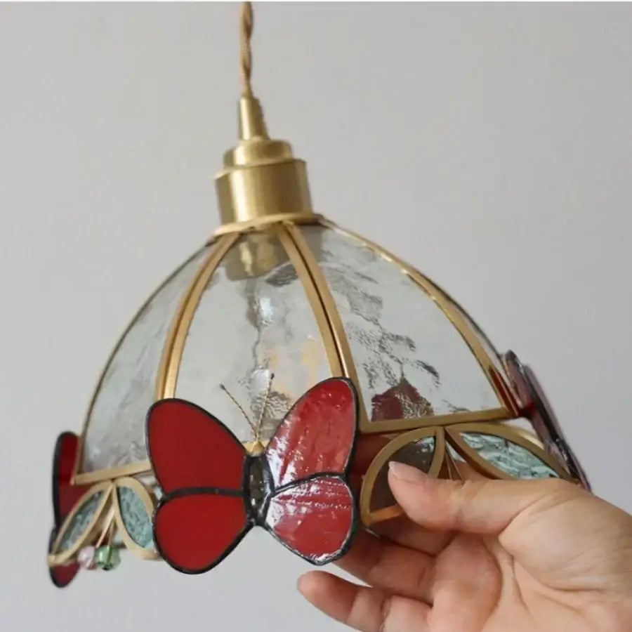 Red stained glass butterfly wall lamp with gold-toned brass framing decorbites tiffany butterfly glass LED light
