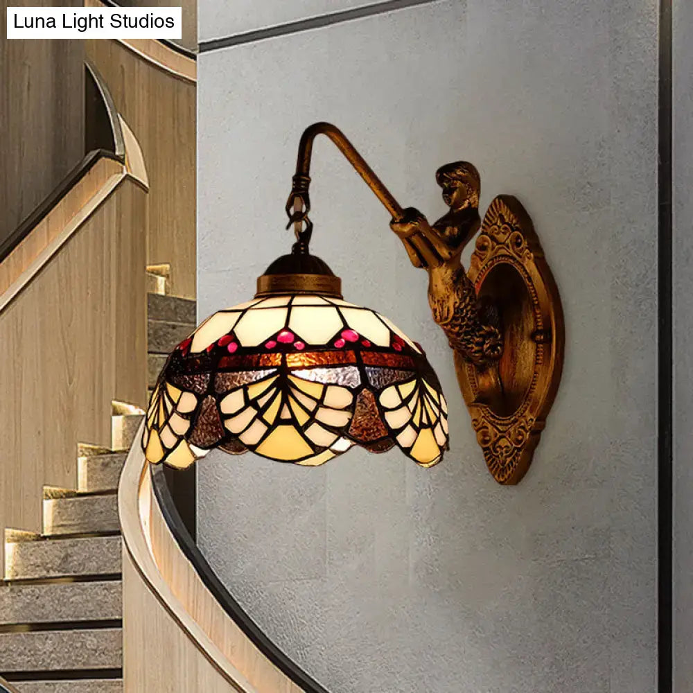 Antique-style tiffany gold cut floral wall sconce with cream amber and pink mosaic glass in mermaid brass fixture