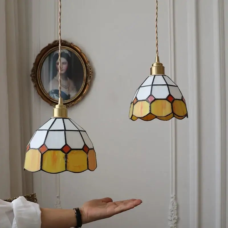 Yellow and white stained glass led pendant lamp with brass accents for dining room lighting