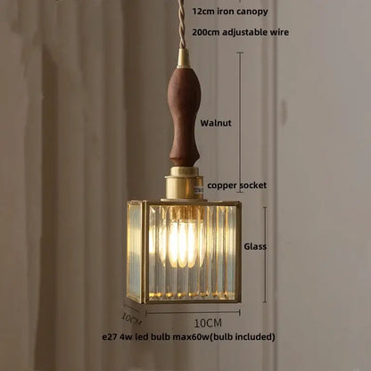 A warm-toned square glass led pendant lamp with brass frame and walnut iron canopy for dining room use