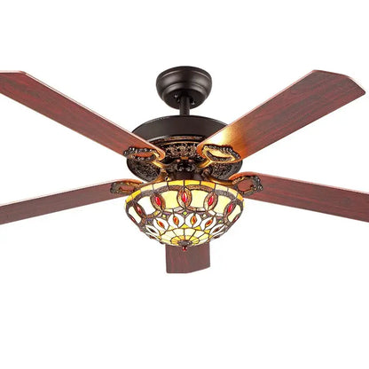 Tiffany ceiling fan light with dark bronze hardware, mahogany blades, and amber red stained glass for living room
