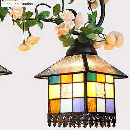 Decorbites tiffany style island light fixture with colorful stained glass panels and black wrought iron frame for balcony use