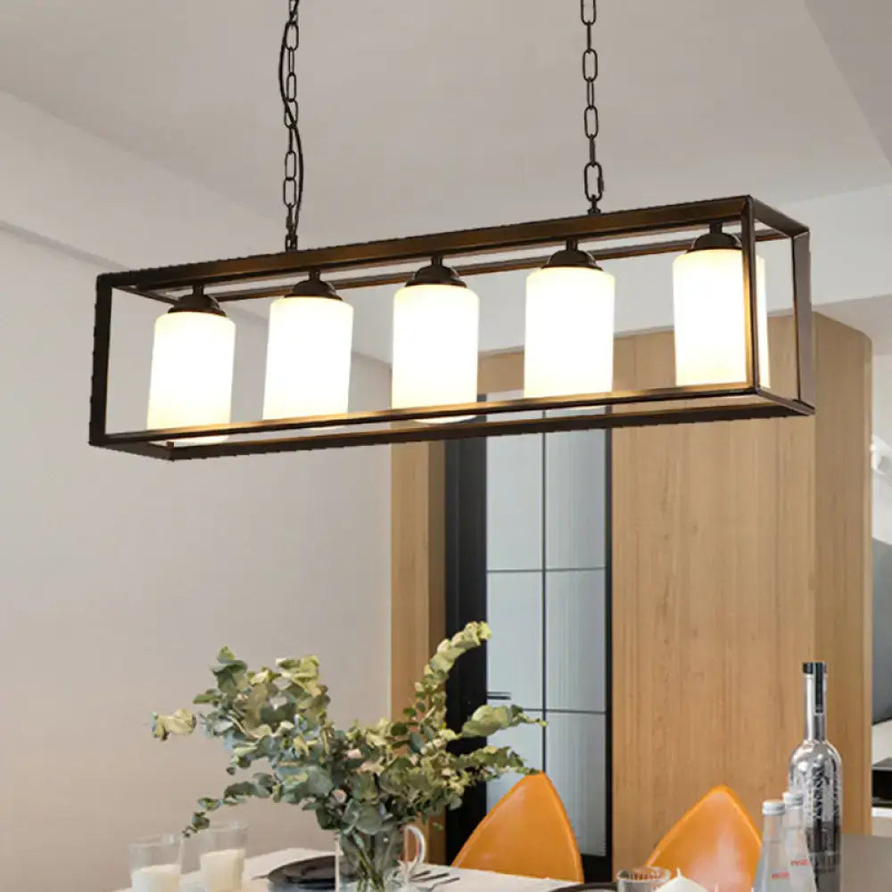 DecorBites traditional black metal rectangular pendant light with five cylindrical opal glass shades for island lighting