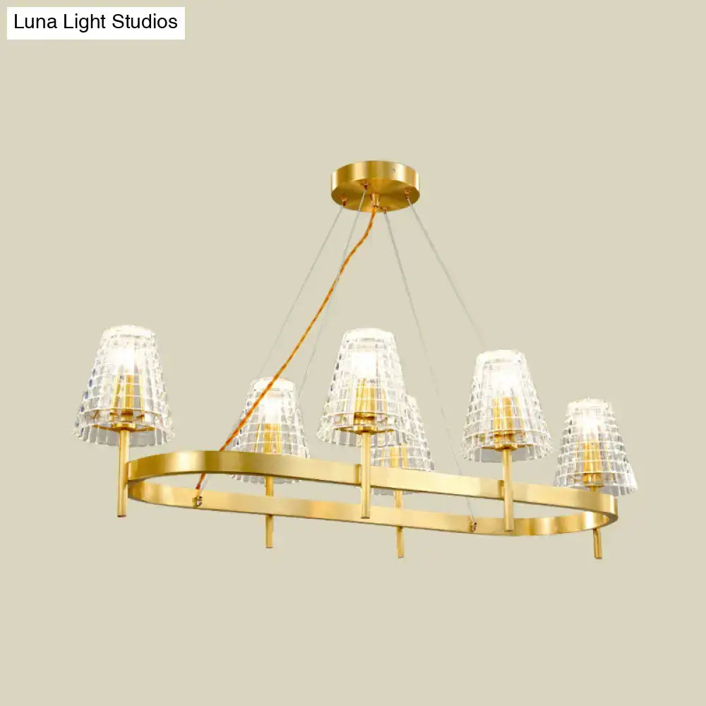 Traditional gold crystal island pendant light with five crystal-encrusted lampshades and modern gold-toned design