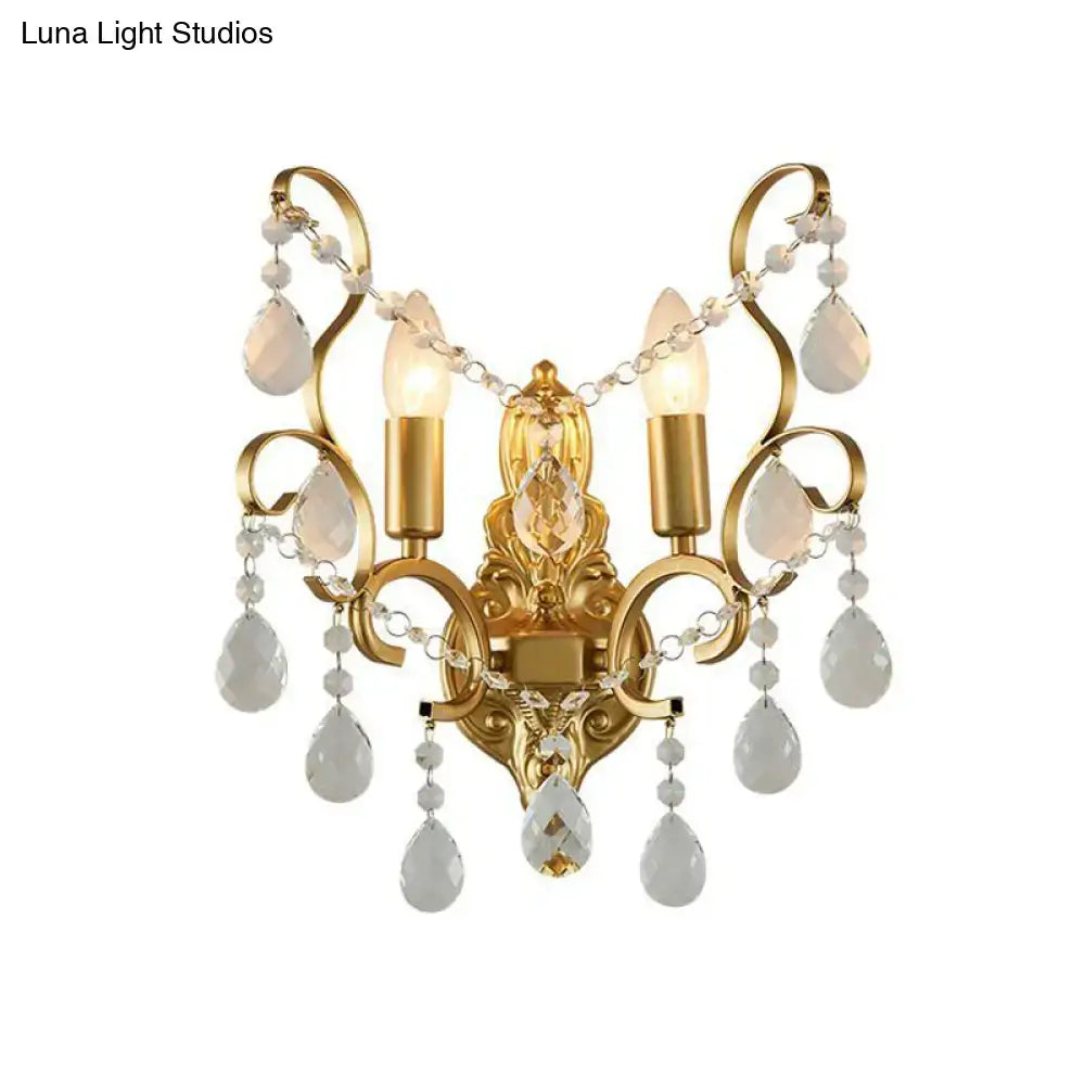 Traditional gold metal candle wall lamp with ornate design and crystal beads for elegant living room wall lamp decor