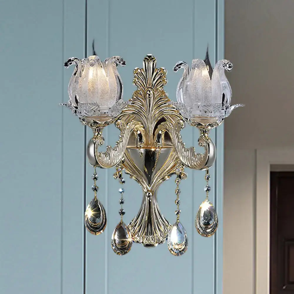 Elegant gold-toned frosted glass sconce with crystal tulip shades and teardrop crystals for living room wall light