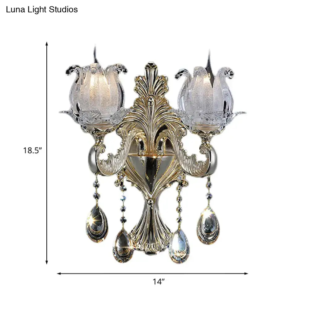 Elegant gold-toned frosted glass sconce with crystal tulip shades and teardrop crystals for living room wall light