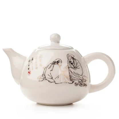 White ceramic dehua clay teapot with black ink illustrations gold accents and red seal in decorbites dehua clay tea set