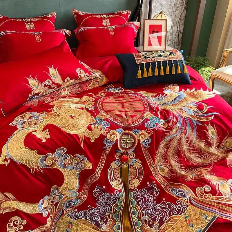 Traditional red and gold loong bedding set featuring luxury gold embroidery of dragon phoenix and double happiness motifs
