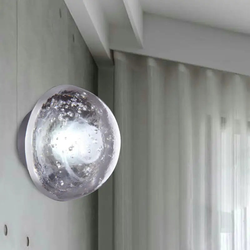 Traditional silver clear crystal bubble wall light features a clear glass globe with silver bubbles and frosted white interior inches wide