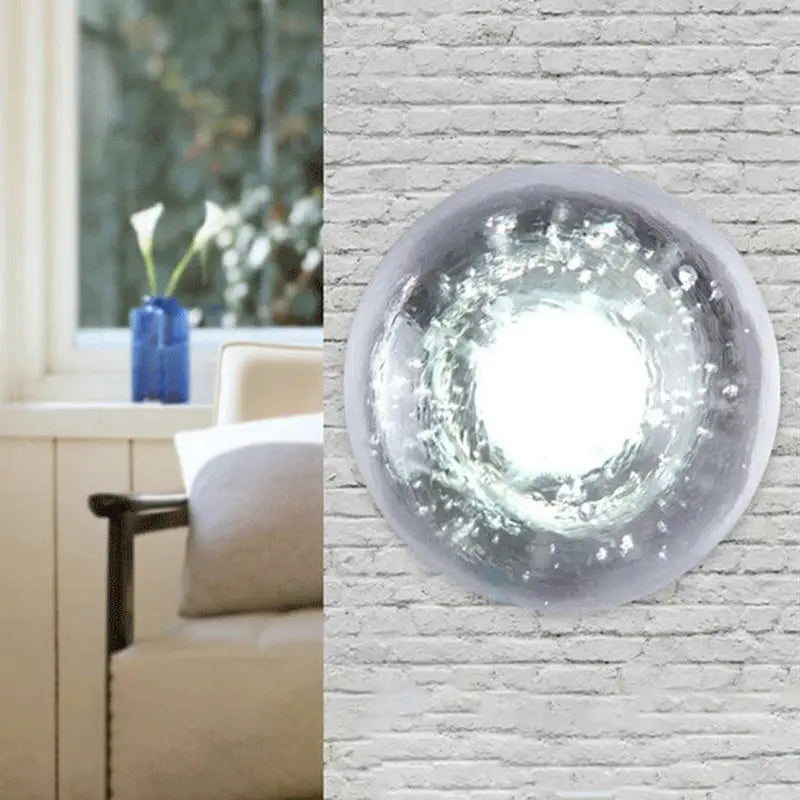 Traditional silver clear crystal wall light with frosted glass and textured swirling pattern inches wide for bedroom use