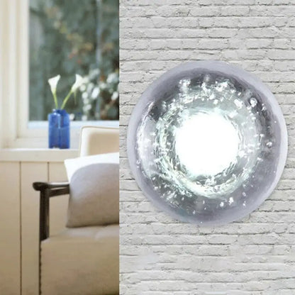 Traditional silver clear crystal wall light with frosted glass and textured swirling pattern inches wide for bedroom use