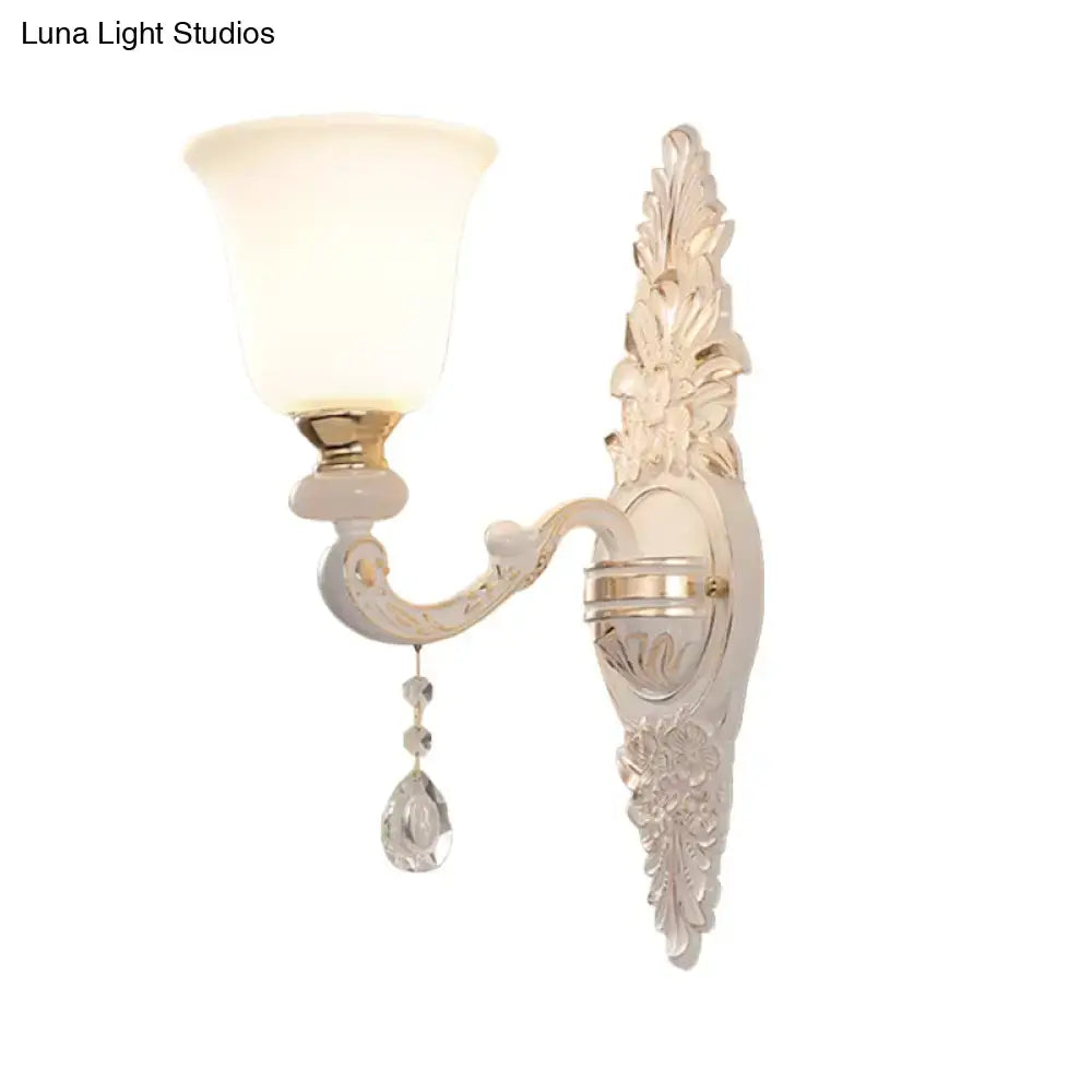 Elegant traditional white glass wall lamp 220v-240v with ivory sconce, gold accents, and crystal teardrop pendant