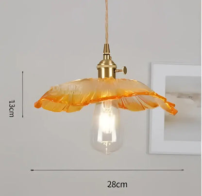 Orange glass pendant light with brass fixture and exposed bulb complement decorbites blue glass pendant lights