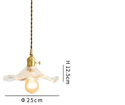 Translucent blue glass pendant light with brass fixture and braided cord for dining room decor featuring decorbites blue glass pendant lights