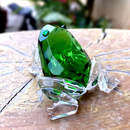 A vibrant green crystal frog figurine with transparent glass legs and emerald eye for living room decorbites decor