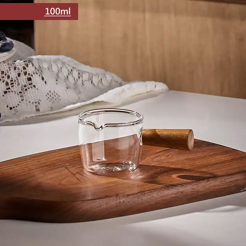 Transparent glass espresso measuring cup with wood handle and silver rim measuring cup 100ml capacity