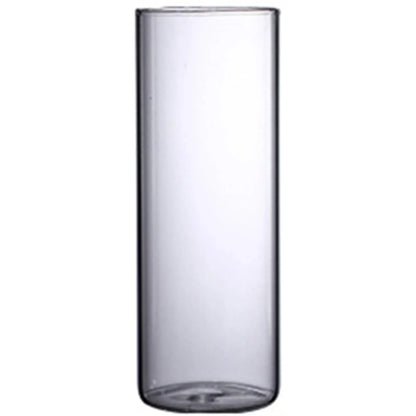 Transparent glass hydroponic vase with a smooth cylindrical surface and rounded edges for wedding and living room decor