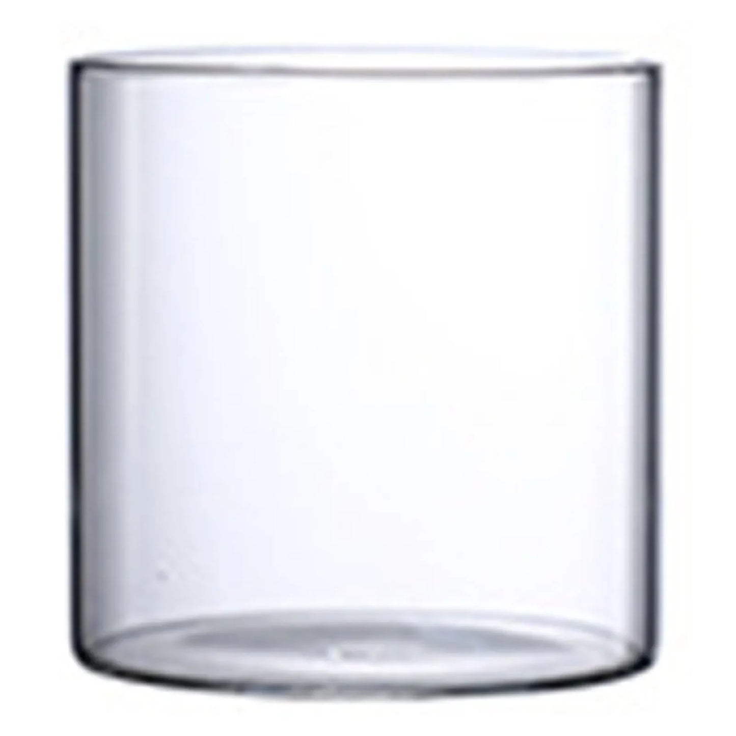 Transparent glass tumbler vase with a simple cylindrical shape for hydroponic flowers and minimalist decor
