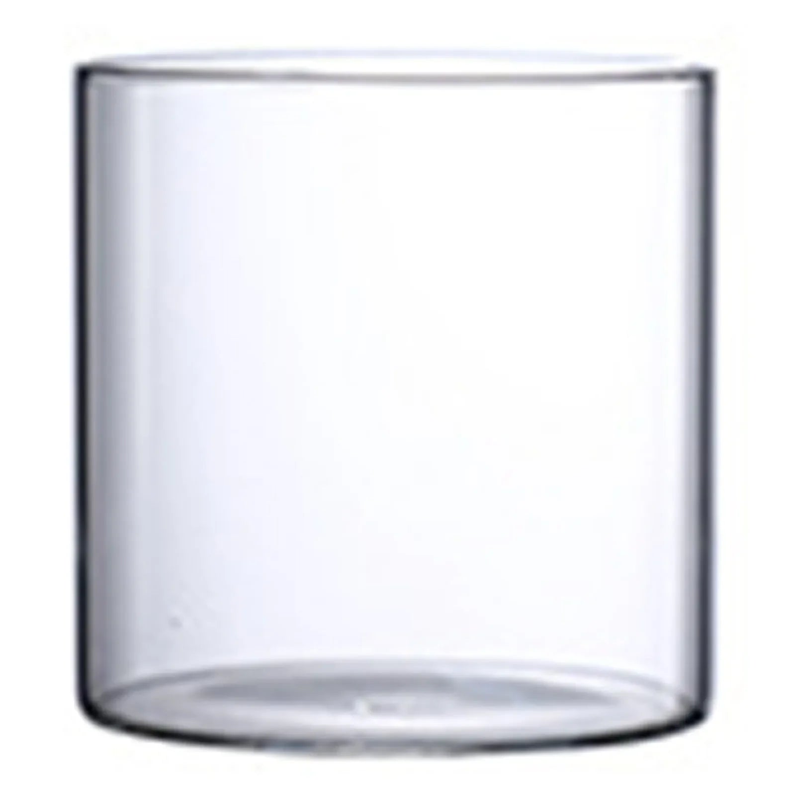 Transparent glass tumbler vase with a simple cylindrical shape for hydroponic flowers and minimalist decor