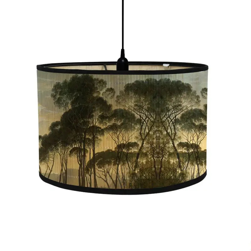 Cylindrical bamboo pendant light with black rim fabric shade featuring dark green trees and golden sky decorbites bamboo pendant