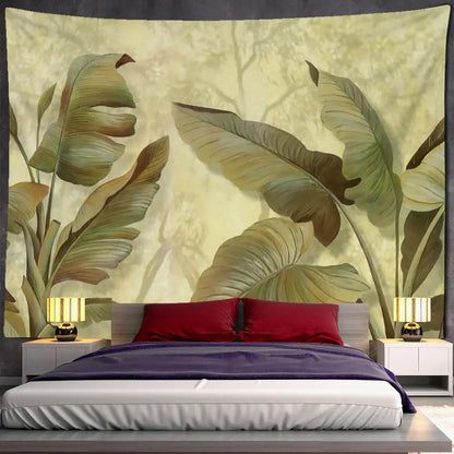 A large beige and green tropical banana leaf tapestry wall hanging above a bed for bedroom decor