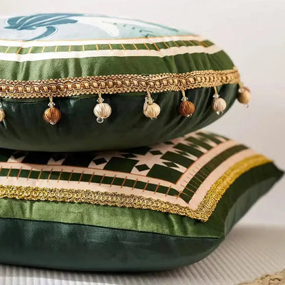 Emerald green satin cushion cover with gold braided trim and ethnic print tassel for decorbites living room decor