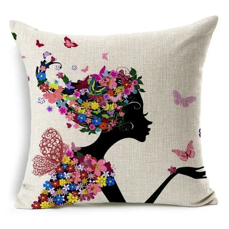 Beige linen throw pillow with black woman silhouette and multicolored floral embroidery for green leaves decorative home decor