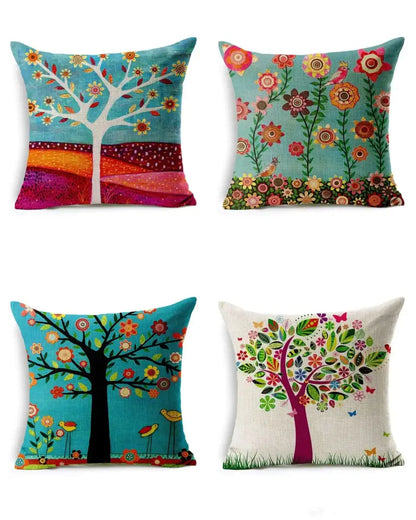 Set of four colorful tree-themed cushion covers with vibrant green leaves decorative patterns for home decor