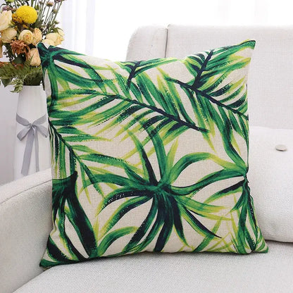 Square cushion cover with vibrant green plant leaves pattern on off-white linen fabric for living room decorbites decor