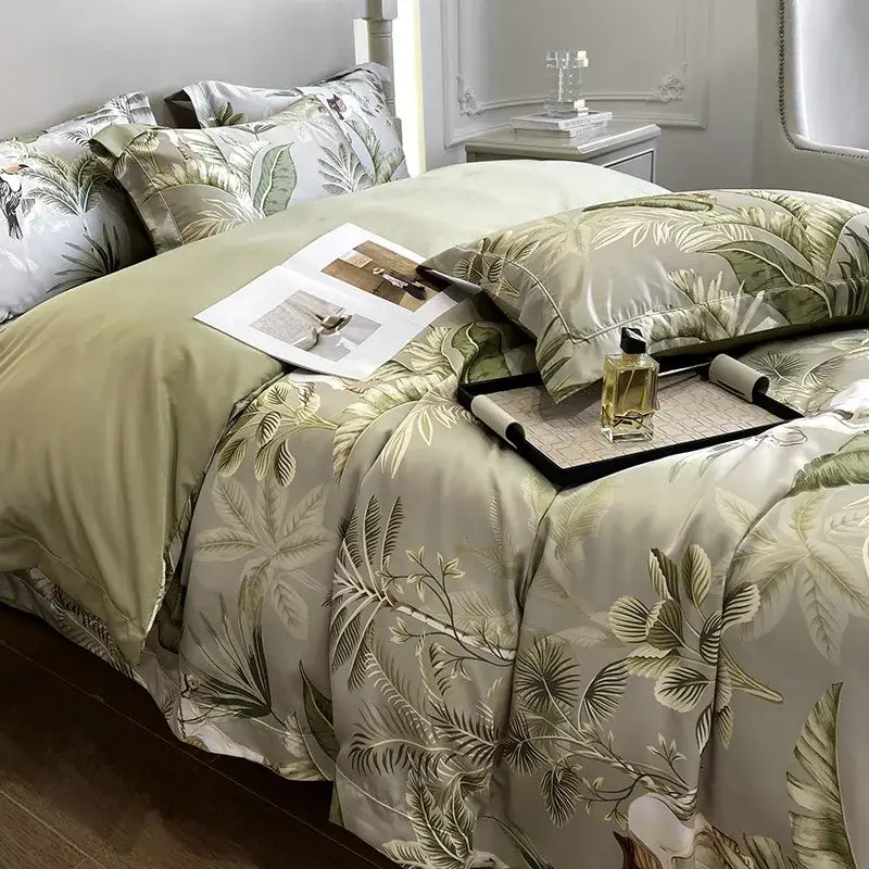 Elegant sage green and cream tropical leaf patterned ice silk plant bedding set from decorbites for bedroom comfort
