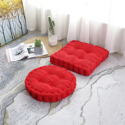 Vibrant red corduroy seat cushion with tufted floor design and rounded edges by decorbites corduroy tufted collection