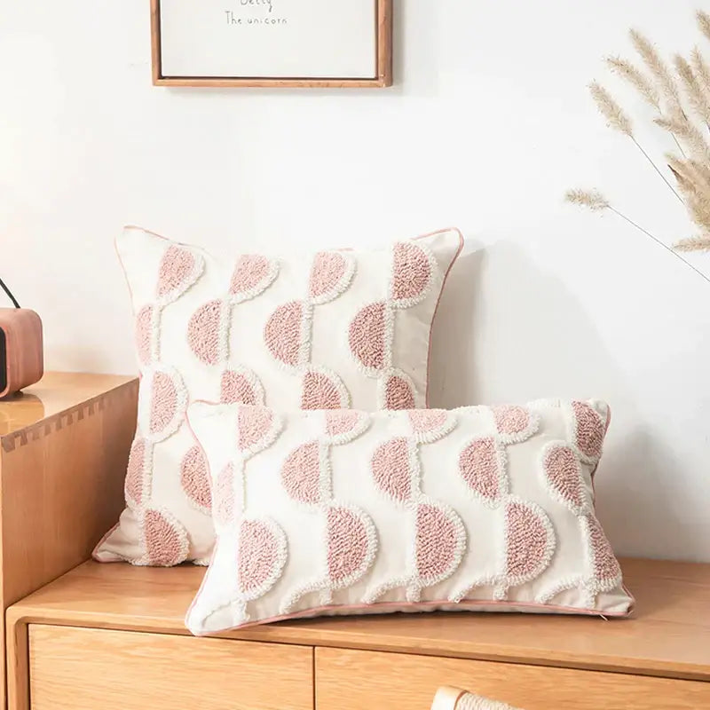 Cream-colored cotton loop tufted cushion cover with blush pink textured circular patterns for living room decorbites decor