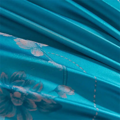 Turquoise blue satin jacquard bedding set featuring vibrant teal fabric with delicate pink and blue floral embroidery