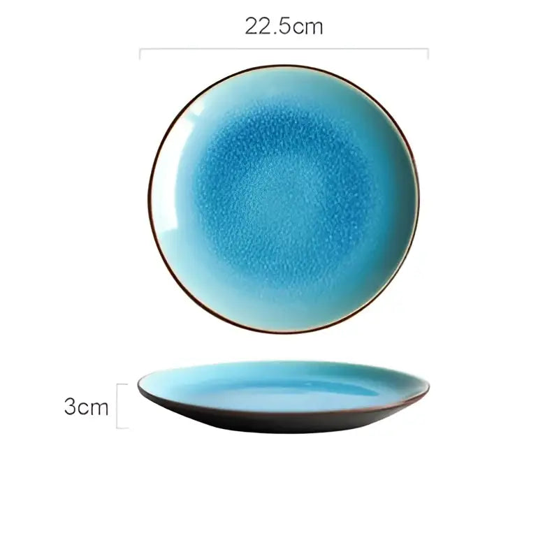 A round ceramic tableware set plate with turquoise ice cracking glaze and dark brown rim 22.5cm diameter