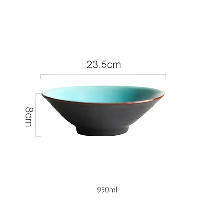 A sleek black ceramic bowl with turquoise ice cracking glaze interior and brown rim for 950ml in ceramic tableware set