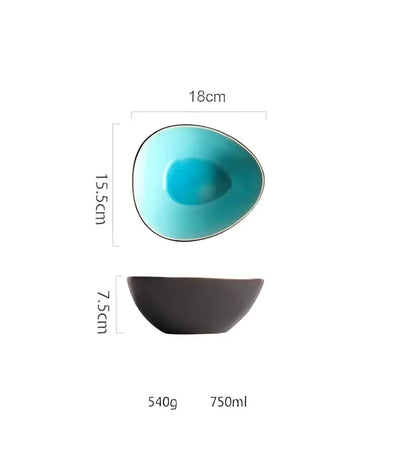 A sleek egg-shaped ceramic tableware set bowl with vibrant turquoise ice cracking glaze interior and matte black exterior