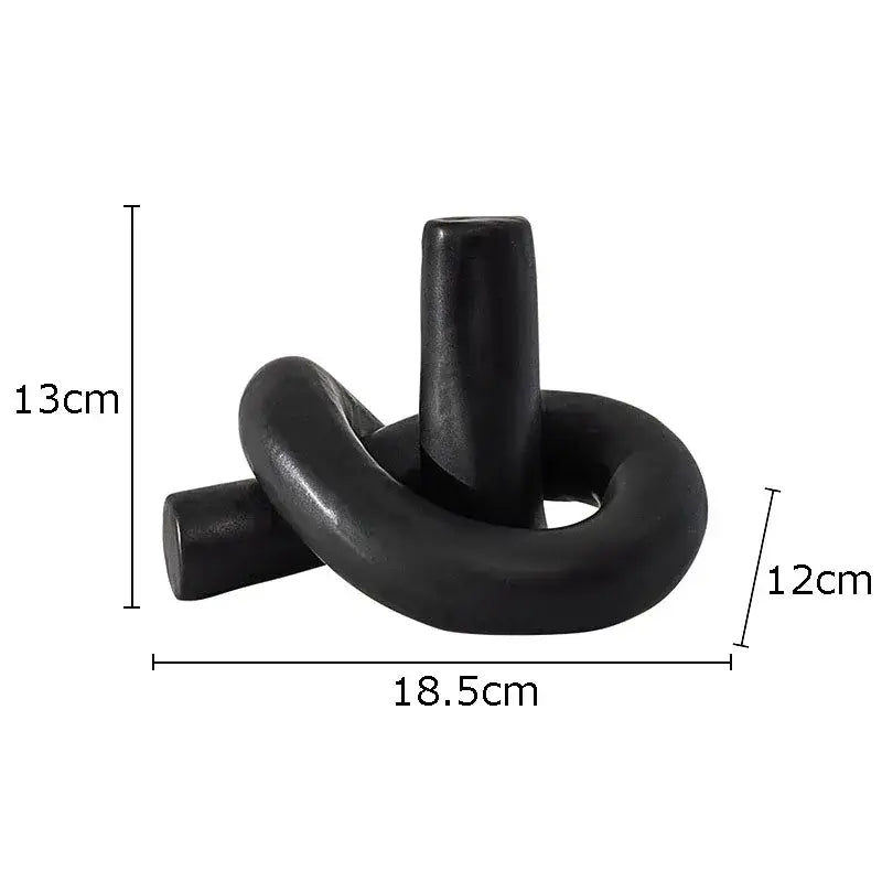 Black ceramic candle holder with sleek twisted knot design for decorbites ceramic desktop storage and desktop storage paper use