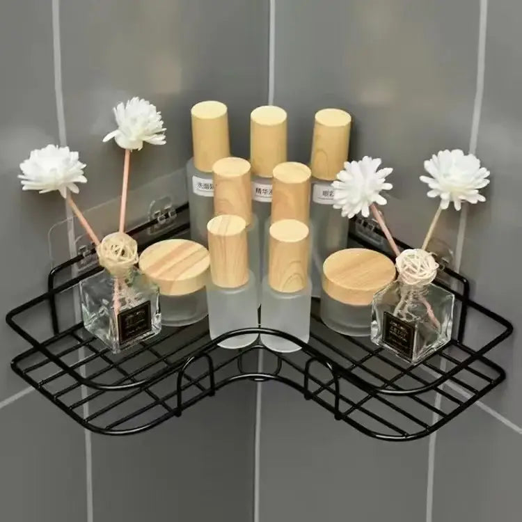 Two tier black metal corner storage shelves holding glass and frosted bottles with wooden caps for bathroom storage decorbites corner bathroom