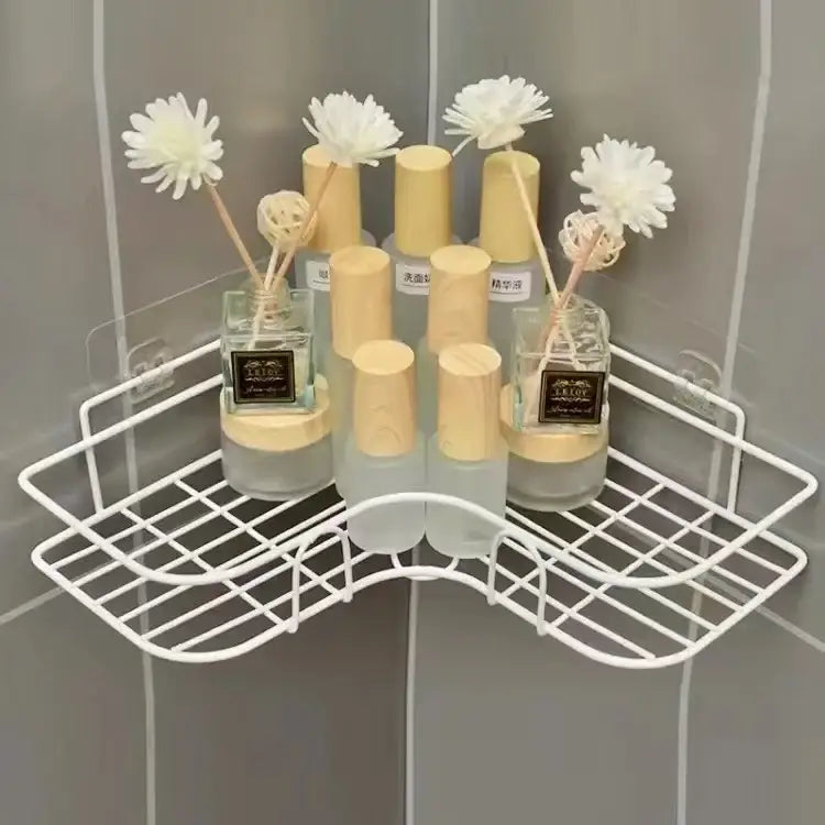 White wire two tier corner storage shelves holding reed diffusers for bathroom storage decorbites corner bathroom
