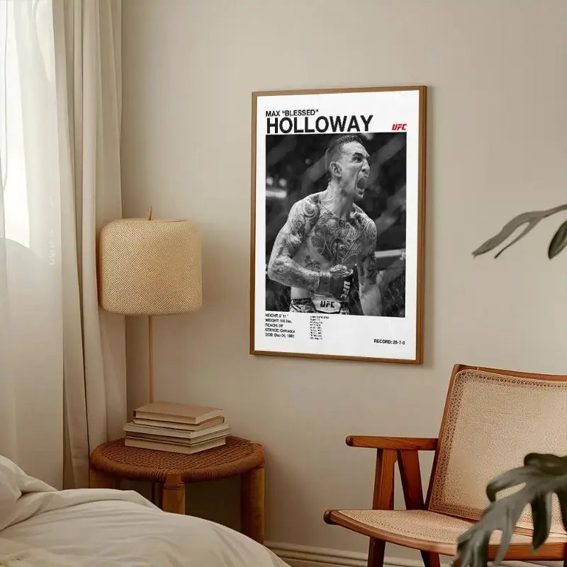 A framed black and white max holloway ufc canvas print with stats in a light wood frame for gym decor