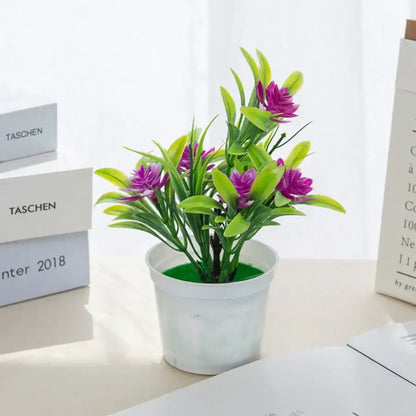 A vibrant artificial flowers bonsai with purple blooms and green leaves in a white plastic vase for decorbites artificial flowers decor