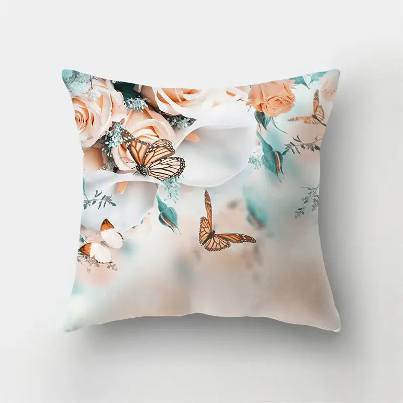 Square throw pillow with soft watercolor peach roses greenery and orange monarch butterflies on cream decorbites butterfly flower pillow case